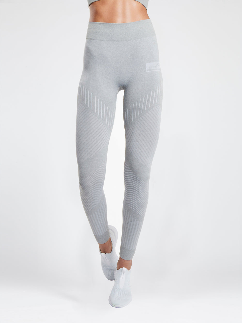 Nike Plus high waisted logo waistband leggings in grey